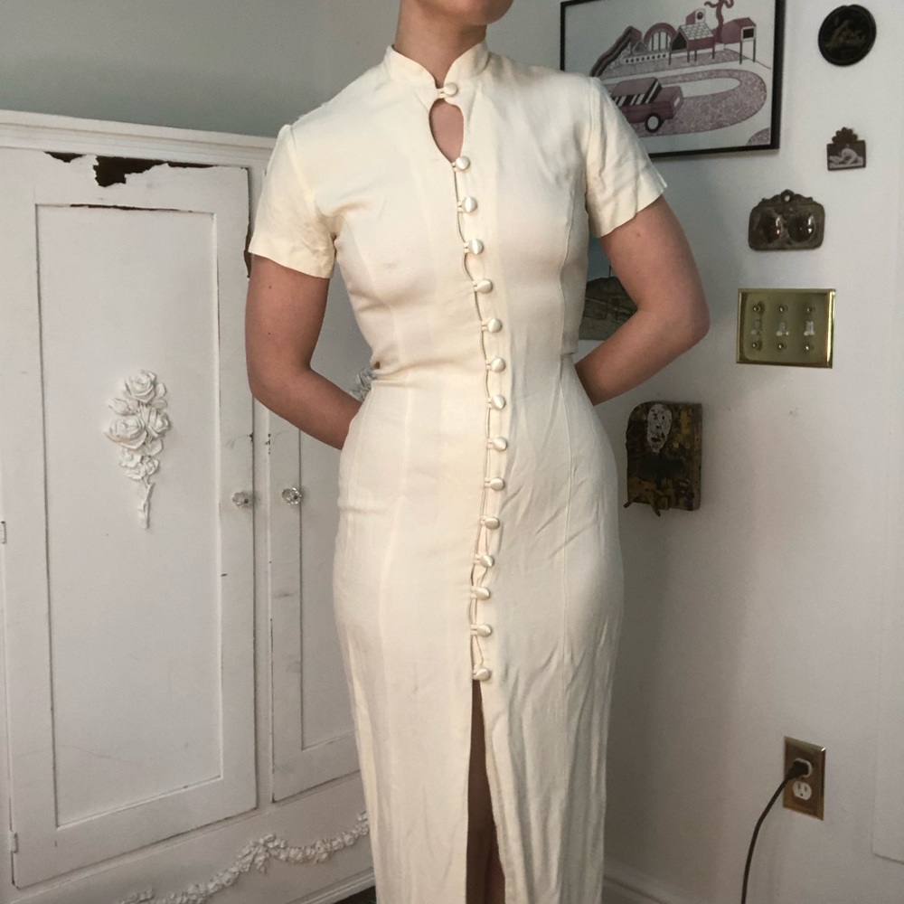 Elegant cream cocktail dress w high neck & buttons